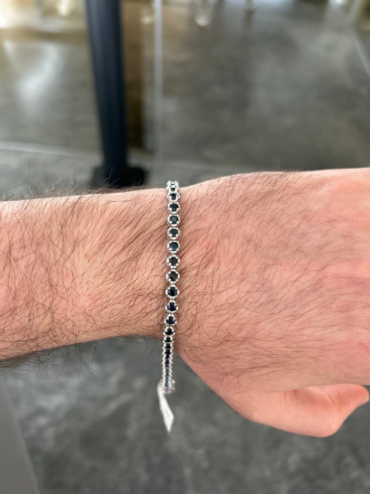 Pulsera Tennis Bisel de Zafiro en Oro Blanco